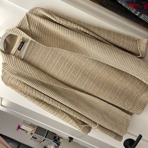 Long, golden sweater